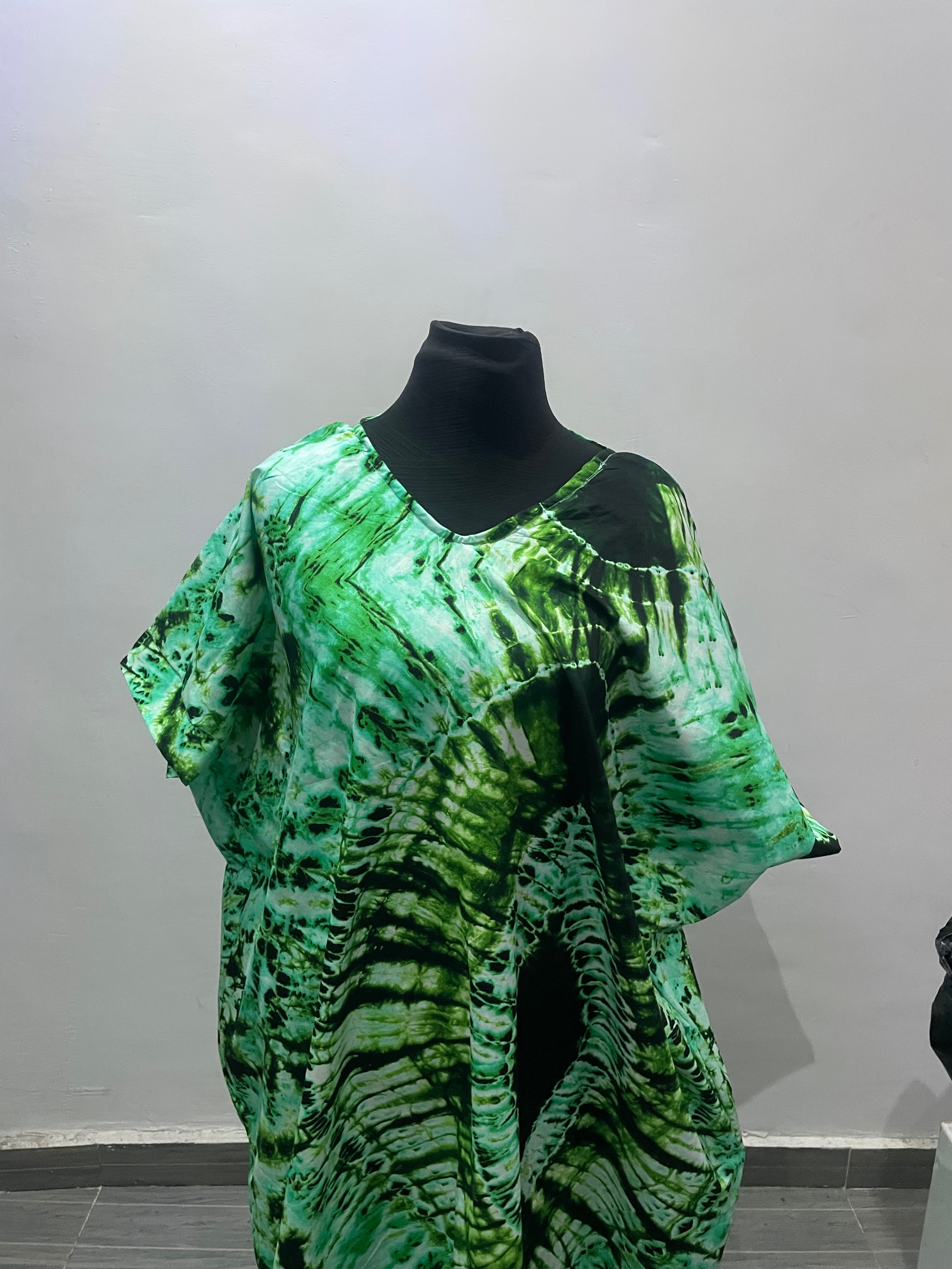 GREEN GOWN WITH BOW AT THE BACK
